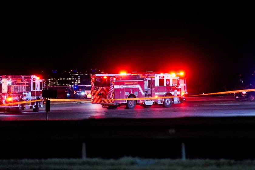 Plane carrying more than 60 collides with helicopter crashes in Washington